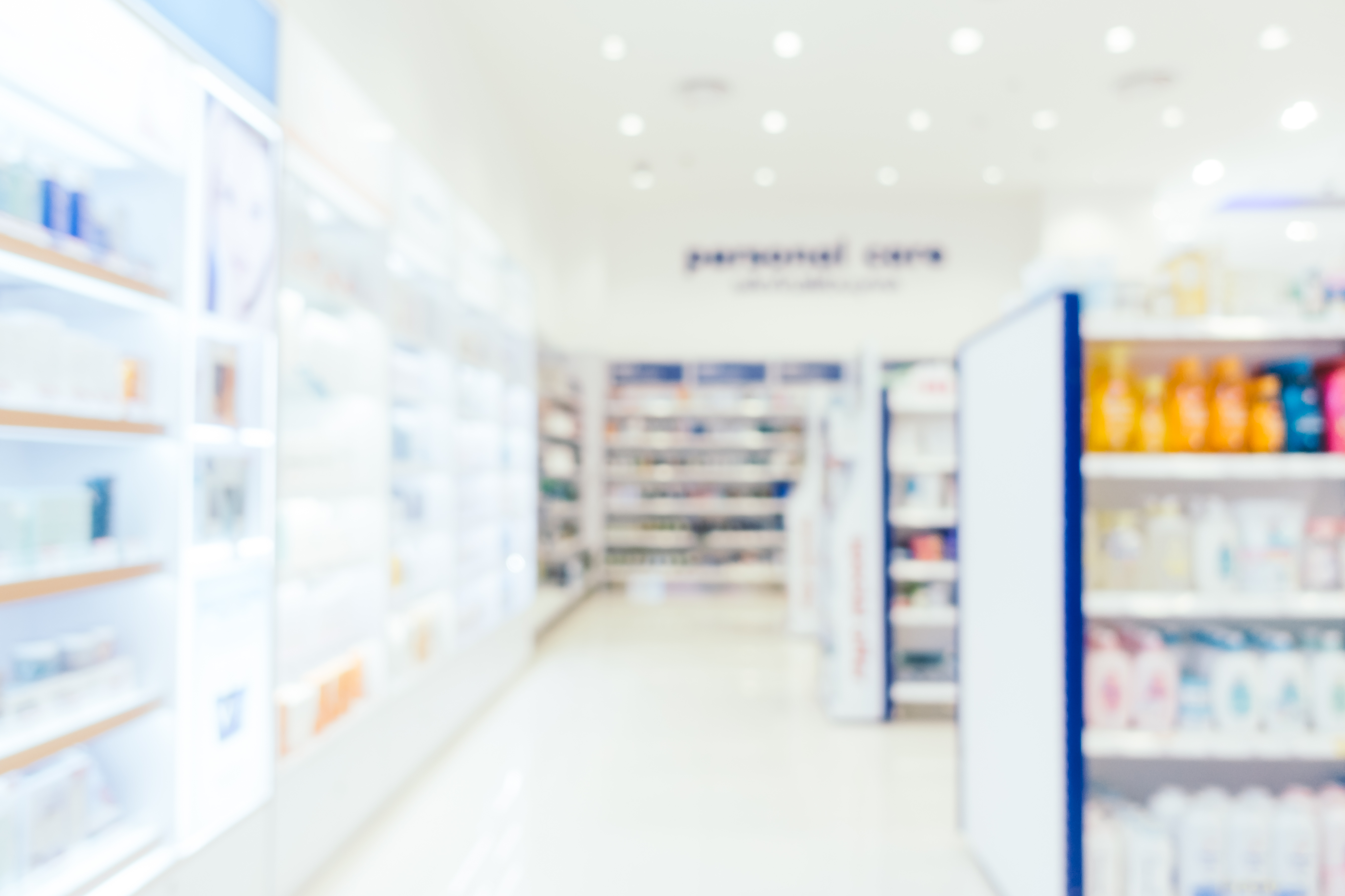 Abstract blur and defocused pharmacy and drug store interior for background
